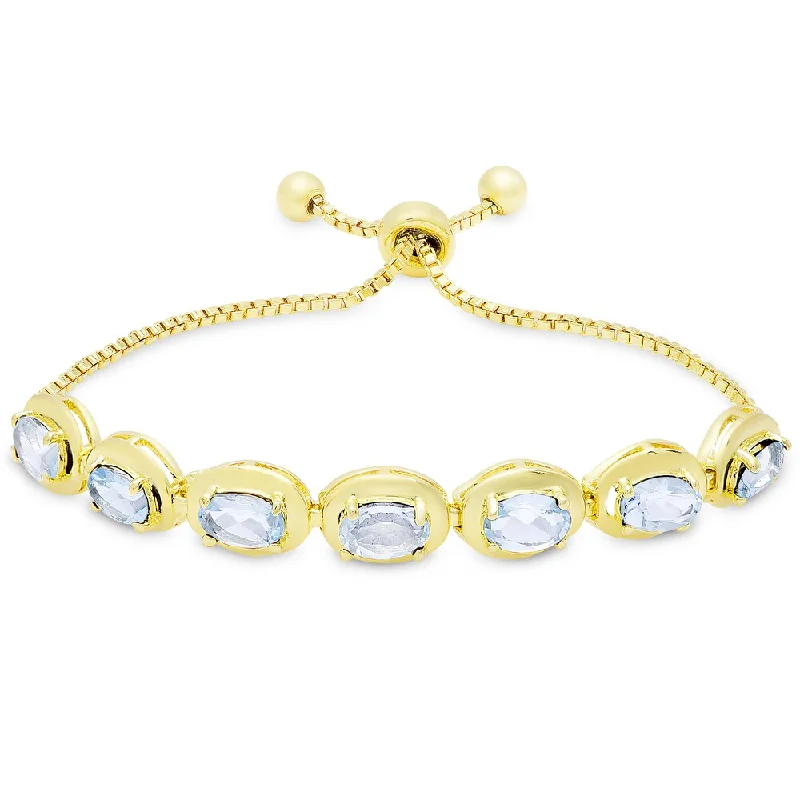 Custom silver bracelets for women-Dolce Giavonna Gold Overlay Blue Topaz Oval Adjustable Slider Bracelet