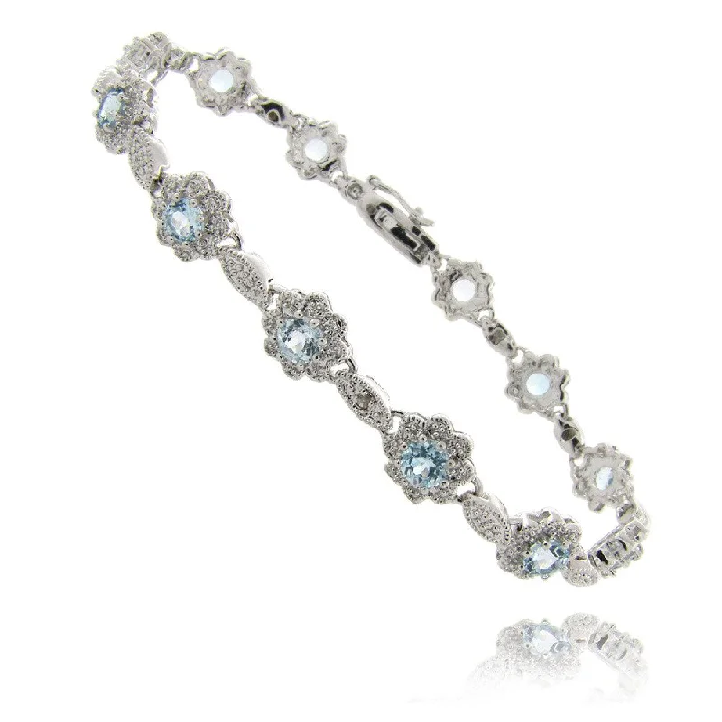 Best bracelets for gifts for her-Dolce Giavonna Silver Blue Topaz and Diamond Accent Flower Link Bracelet