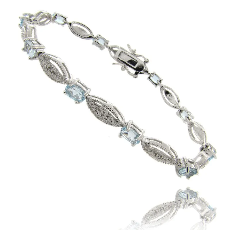 Custom name bangles for her-Dolce Giavonna Silverplated Blue Topaz and Diamond Accent Bracelet