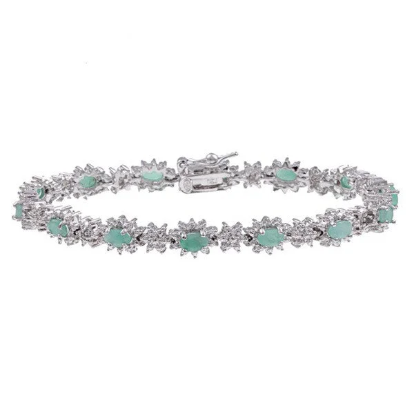 Best friendship bracelets for girls-Dolce Giavonna Sterling Silver Oval-cut Emerald and Diamond Accent Bracelet