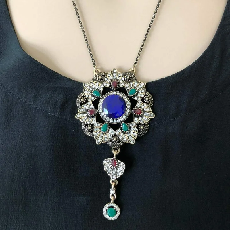 gold necklace for women -Ornate Gold Pendant Necklace with Blue Red and Green Stones