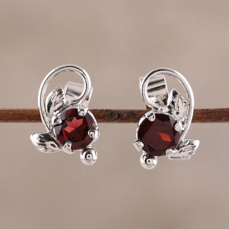 gold earrings for everyday wear -Blissful Radiance Leafy Rhodium Plated Garnet Stud Earrings from India