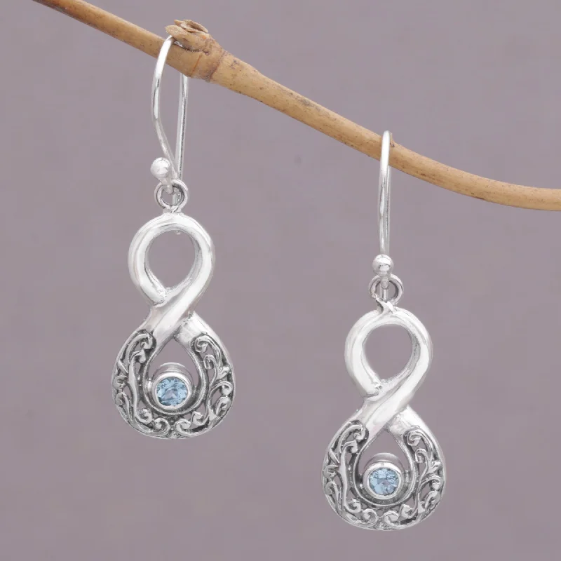 diamond hoop earrings for evening wear -Blue Tangle Blue Topaz and Sterling Silver Looping Earrings from Bali